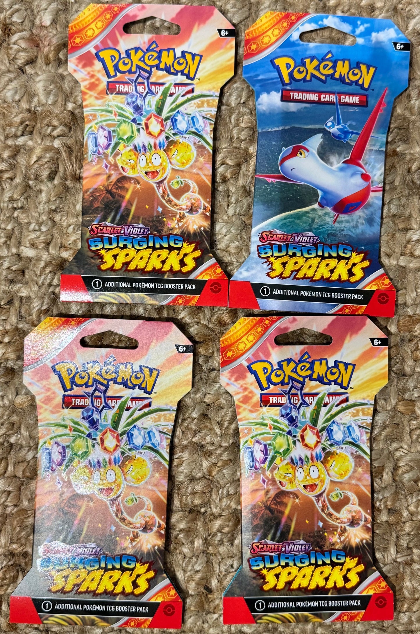 Pokemon Surging Sparks Booster pack 4 pack Bundle