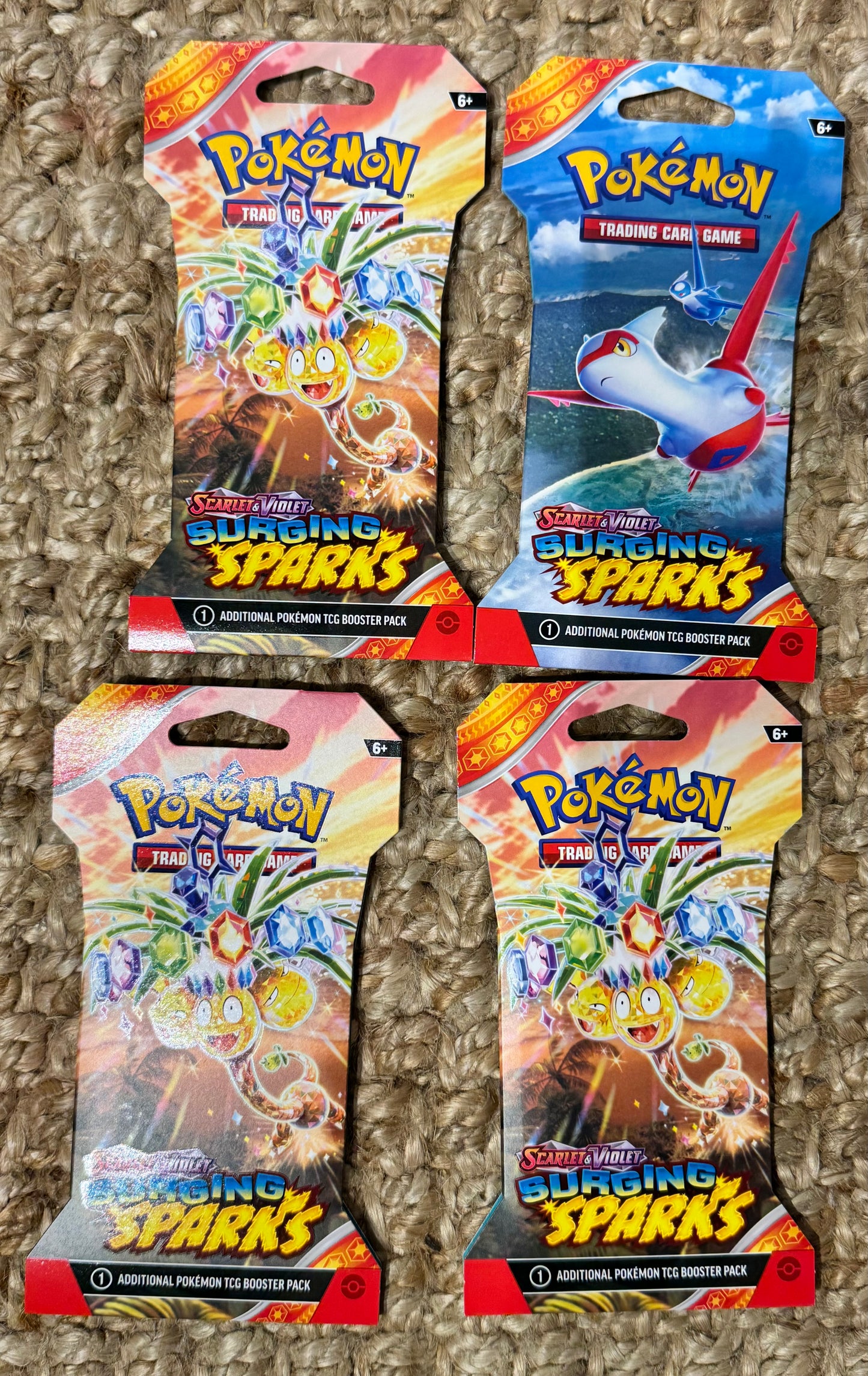 Pokemon Surging Sparks Booster pack 4 pack Bundle