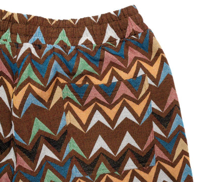 PLEASURES BASKET WOVEN SHORTS IN BROWN